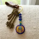 Llavero Circulo mano de Fatima dorada (12x4cm)
