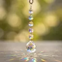 Atrapasol - Cola Tornasol con Cairel de ESFERA (16x3cm)